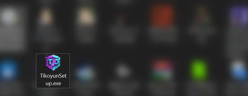 Windows İndirilenler klasörü. TikoyunSetup.exe dosyası işaretlenmiş; diğer dosyalar bulanıklaştırılmış.