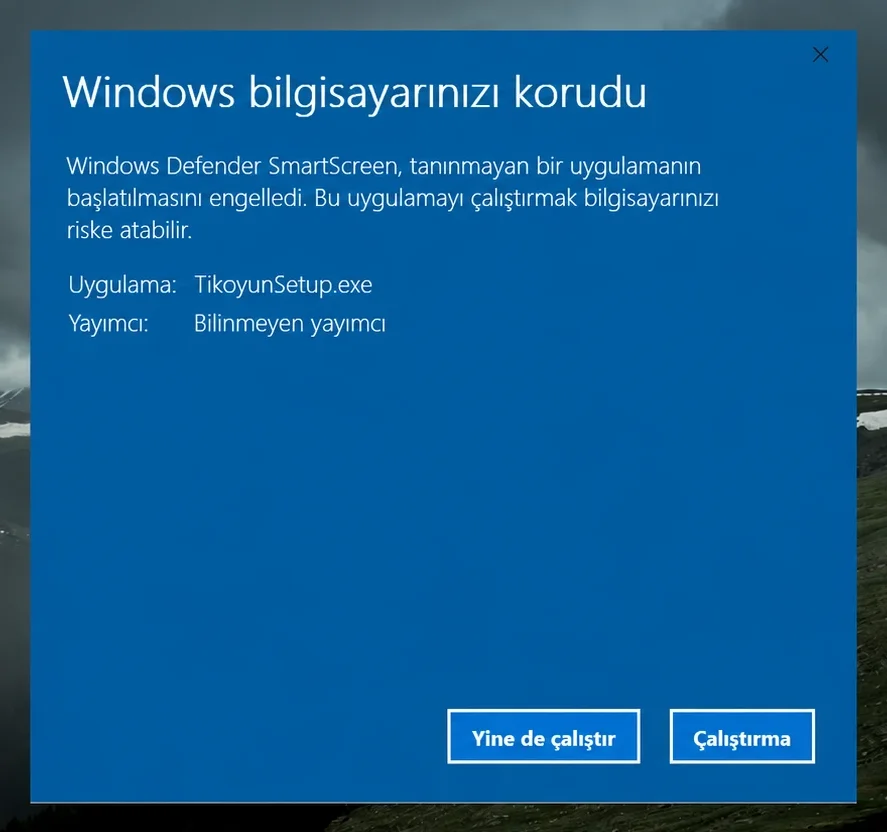 Windows bilgisayarınızı korudu penceresi. Uygulama: TikoyunSetup.exe, Yayımcı: Bilinmeyen yayımcı. Yine de çalıştır düğmesi işaretlenmiş.